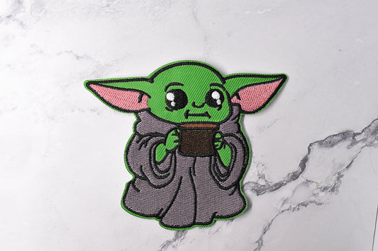 Baby Yoda drinking his coffee iron-on patch