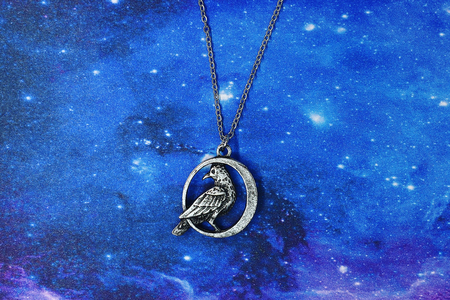 Raven pendant with crescent moon