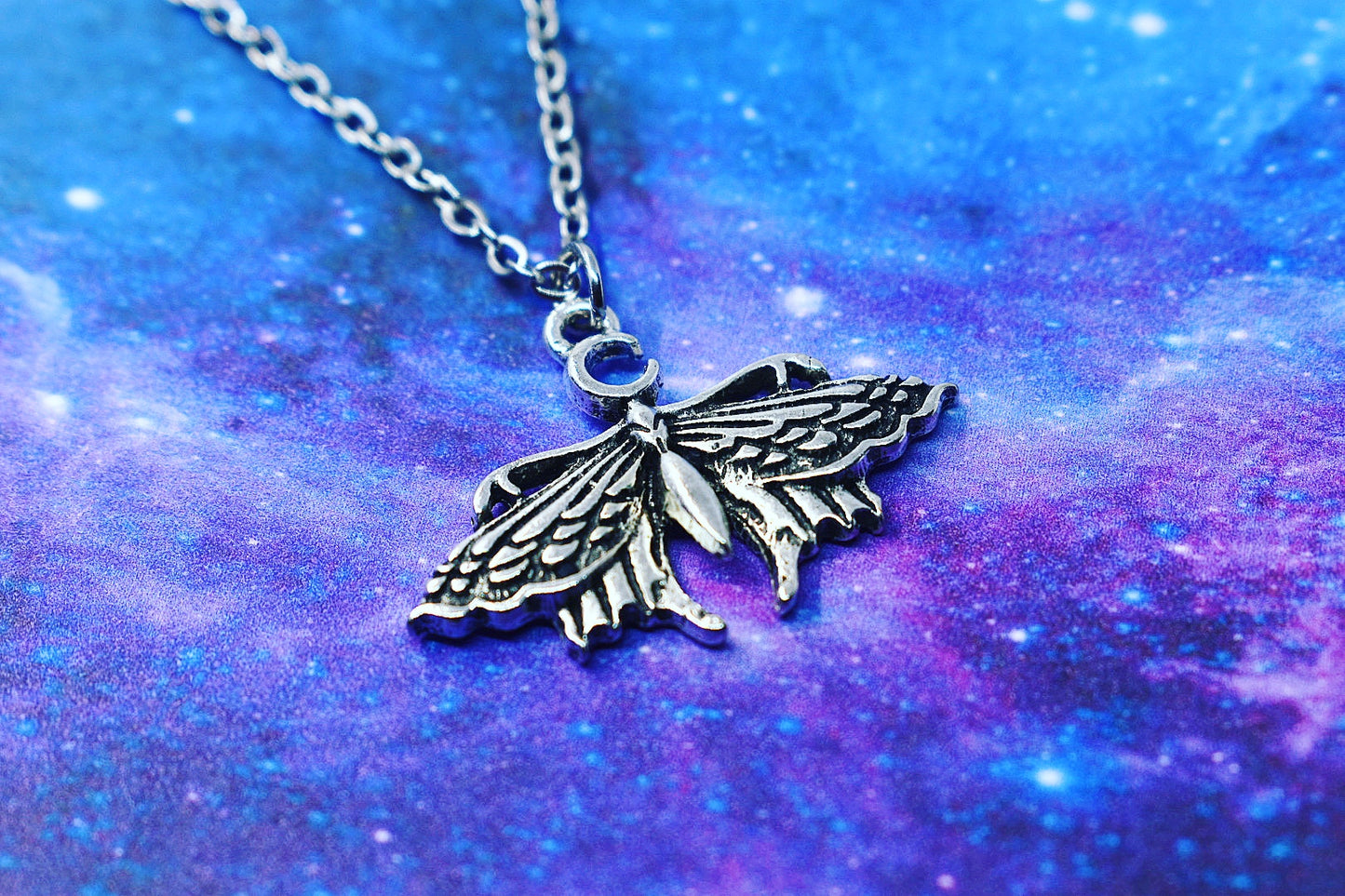 Moth pendant with crescent moon