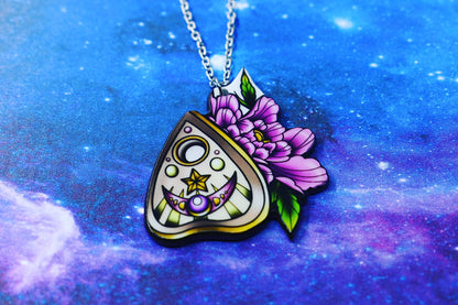 ouija board pendant with flower
