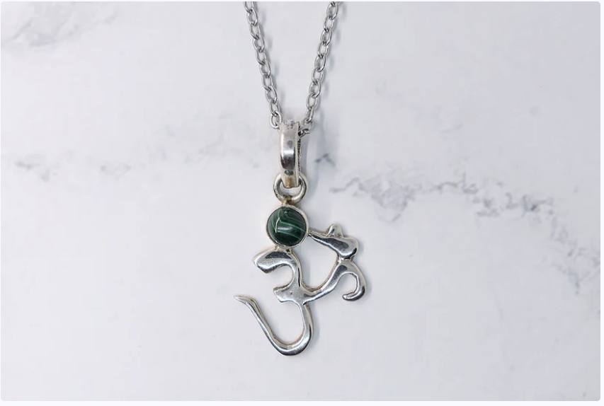 Pendentif symbole du troisième oeil avec pierre malachite