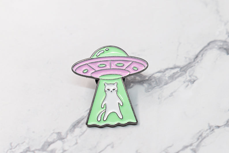 Enamel pin cat kidnapped by a UFO