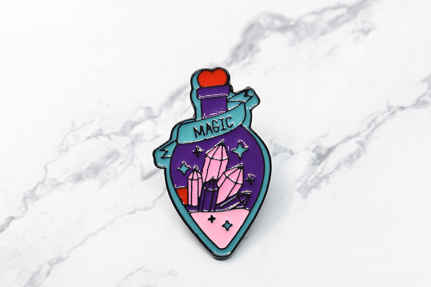 Bottle enamel pin with crystals inside