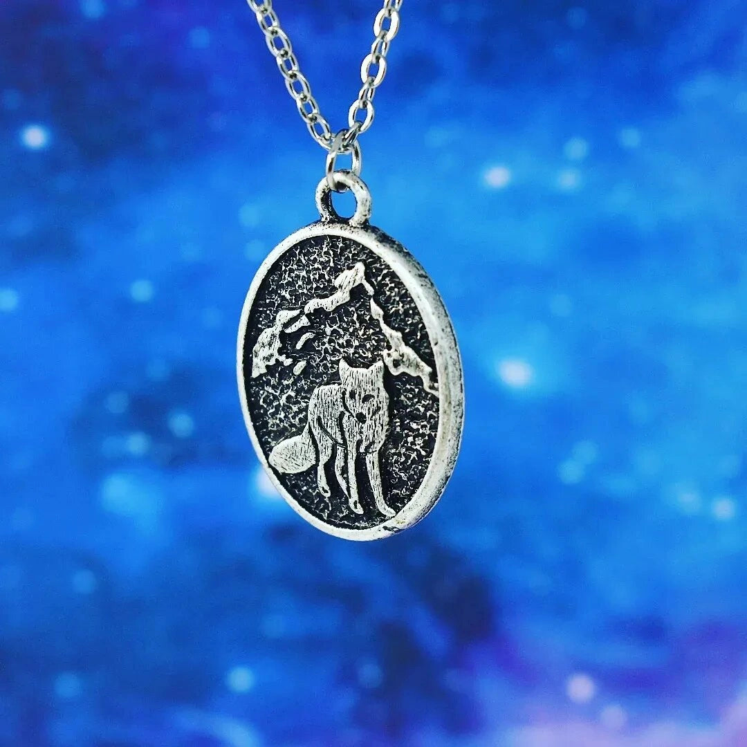 Necklace with pendant wolf, mountain, nature