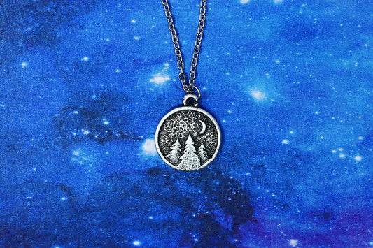 Pendant with forest and crescent moon