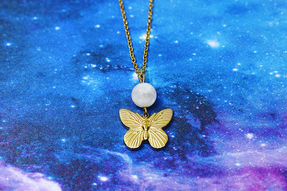 Gold butterfly pendant with moonstone