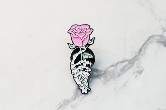 Main Squelette Tenant Rose - Accessoire Élégance Gothique