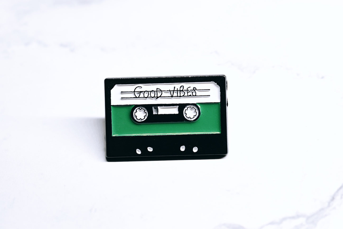 "Good Vibes" Enamel Pin in the Shape of a Vintage Audio Cassette