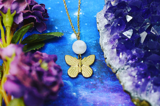 Gold butterfly pendant with moonstone